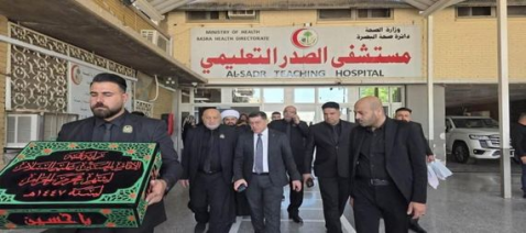وفد العتبة الحسينية المقدسة يزور المرضى الراقدين ف