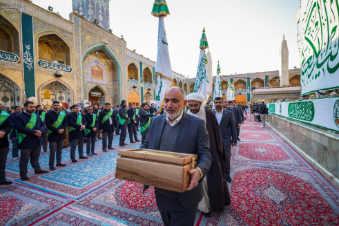 بالصور.. العتبة العلوية ترفع راية (وليد الكعبة) اي