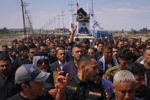 تشييع  رسمي في البصرة لشهيد  جراء قصف العدوان الأمريكي الإسرائيلي